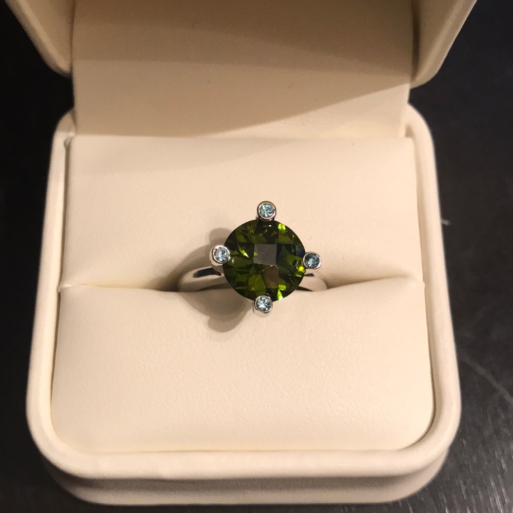 Silver ring with green and blue stones